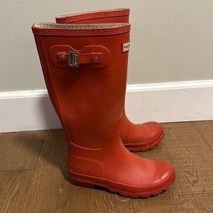 Red tall Hunter rain boots